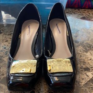 Patten leather heels